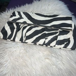 **5/$25 special!! 
Women’s Clutch Zebra